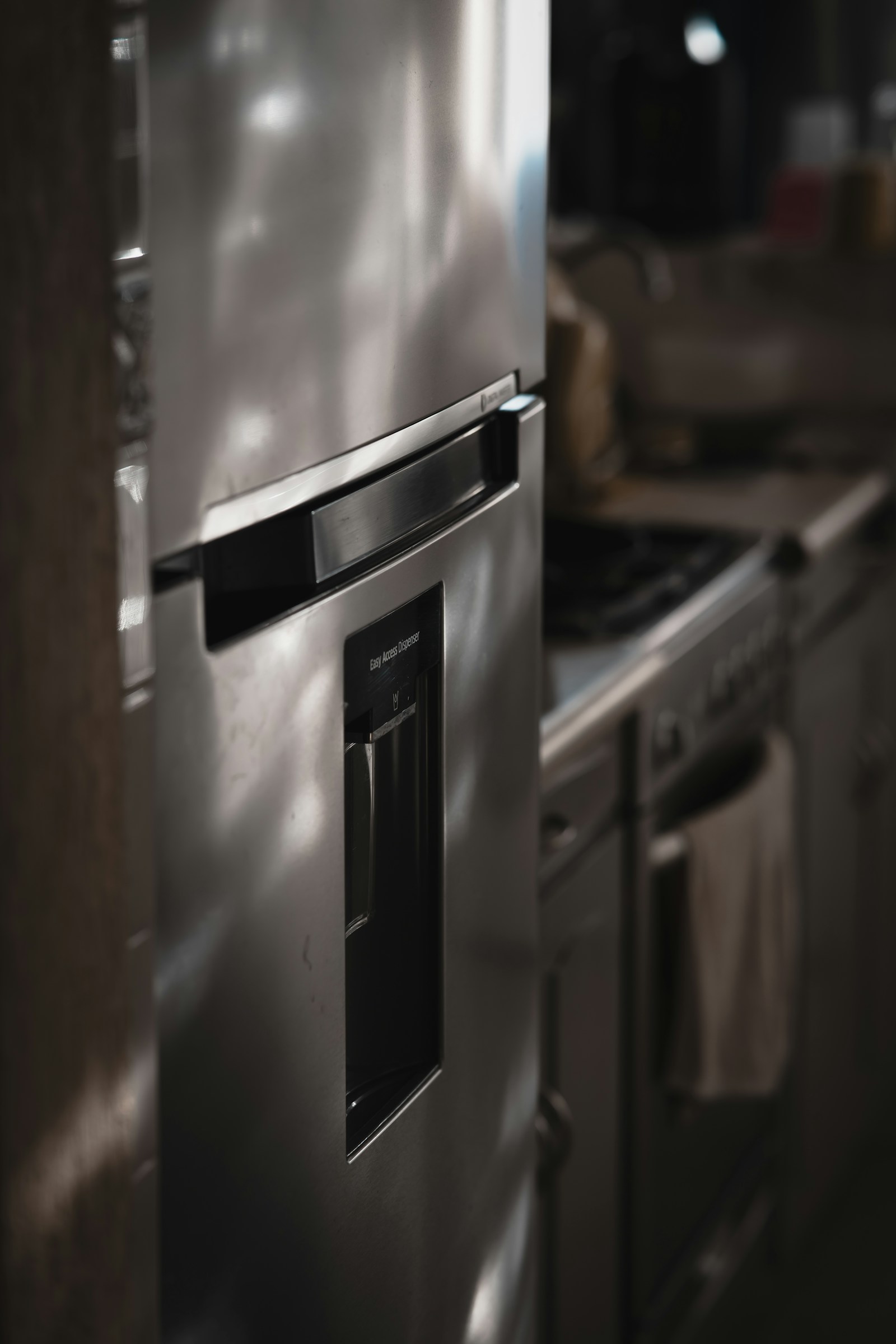 Monogram panel-ready refrigeration column in a luxury kitchen — expert Monogram column refrigeration repair