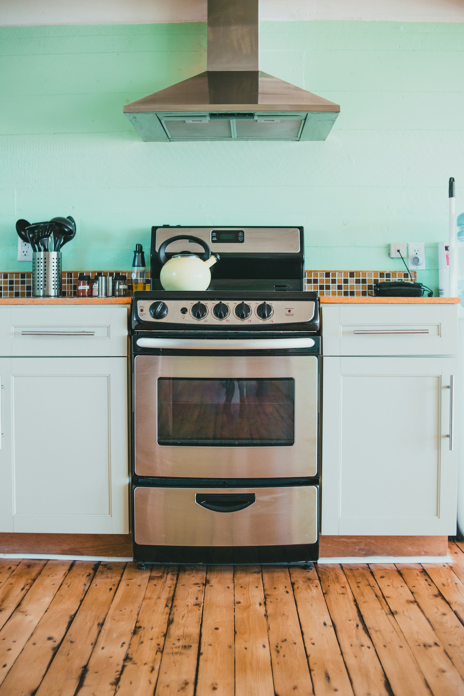 Monogram range in a contemporary built-in kitchen — certified Monogram range service