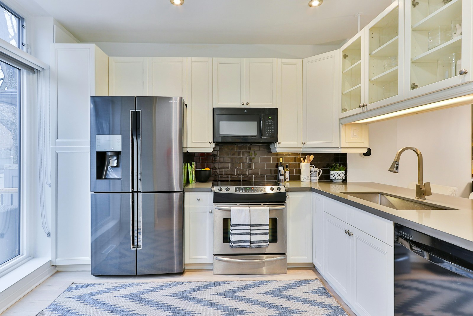 Monogram stainless refrigerator with custom handles — expert Monogram refrigerator repair